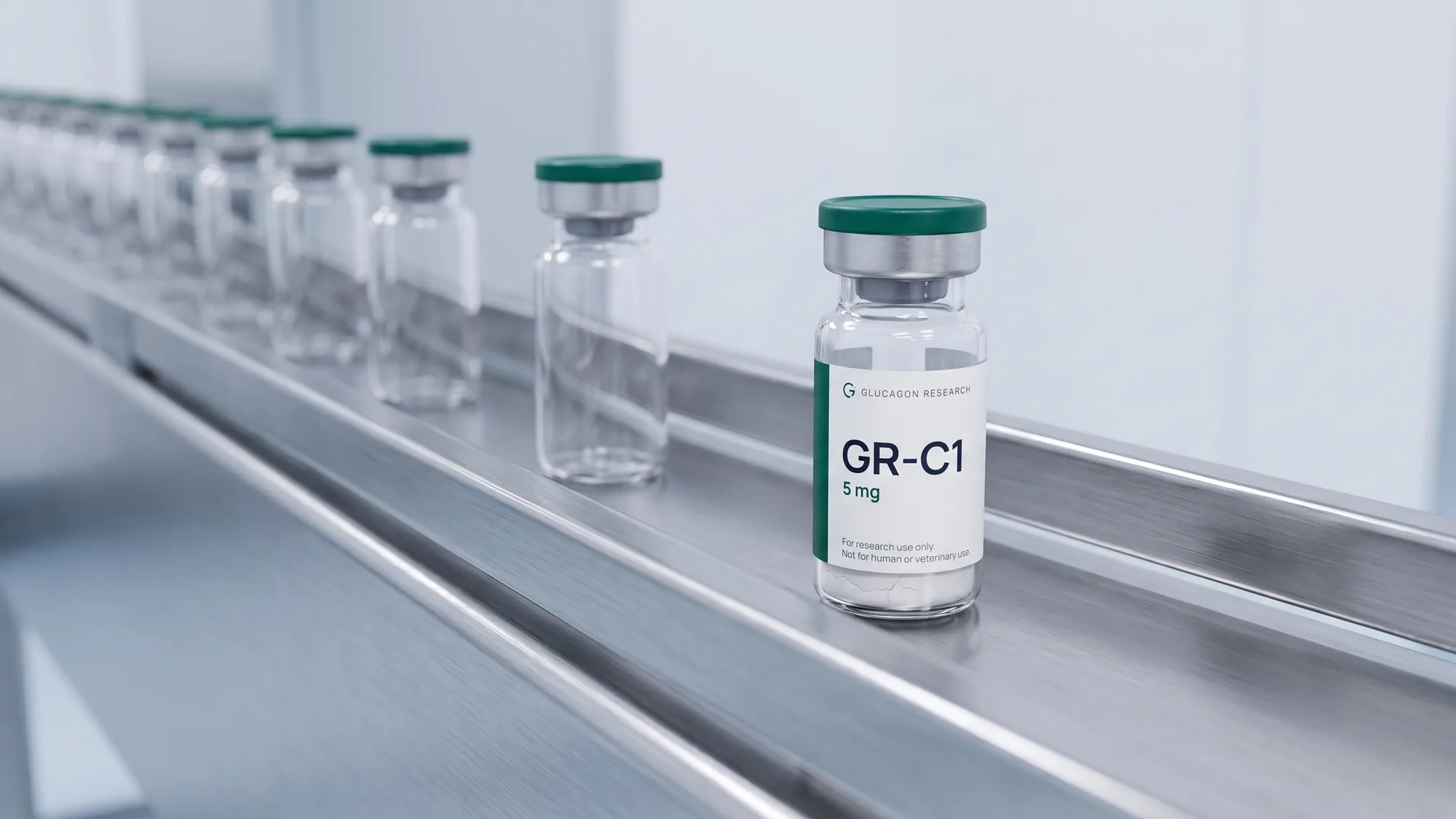 Glucagon Research vials travelling along a filling line, one of them in focus