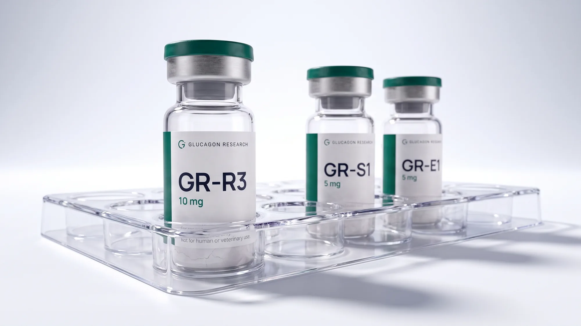 Three Glucagon Research vials seated in a clear laboratory tray